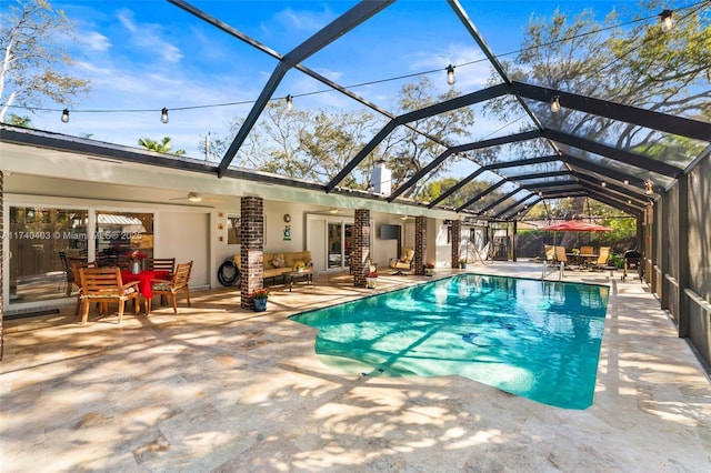 16520 SW 80th Ave, Palmetto Bay, FL 33157 - swimming pool featuring a patio area, a ceiling fan, and a lanai