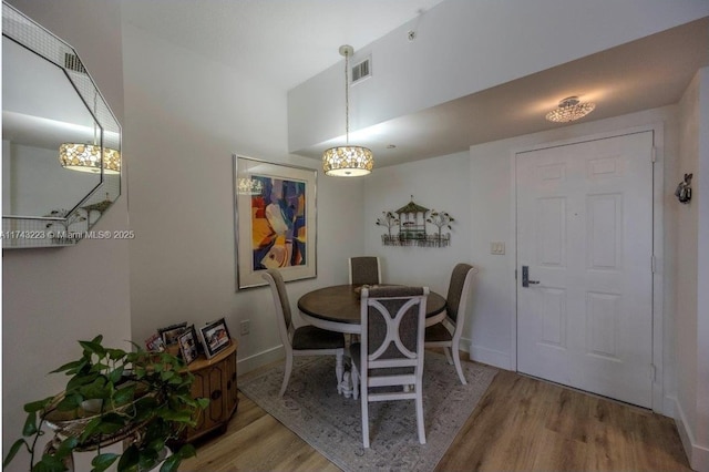 dining area featuring hardwood / wood-style floors