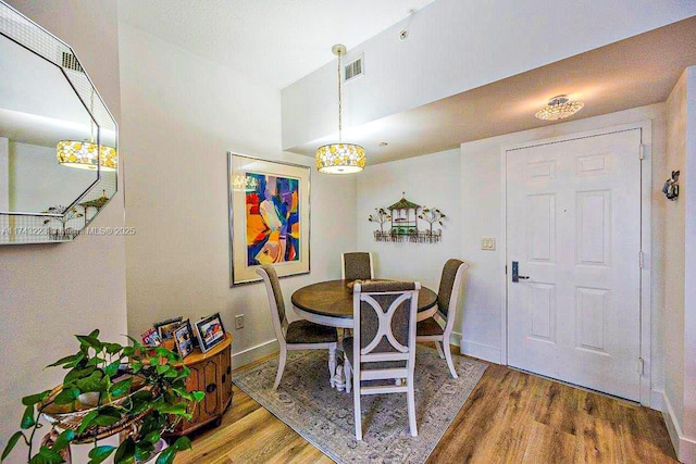 510 NW 84th Ave Unit 640, Plantation, FL 33324 - dining space featuring wood finished floors and baseboards