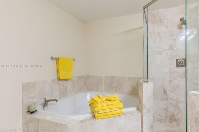510 NW 84th Ave Unit 640, Plantation, FL 33324 - bathroom with a shower stall and a garden tub