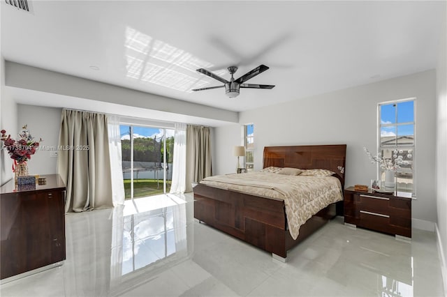 bedroom with a ceiling fan, access to outside, and visible vents