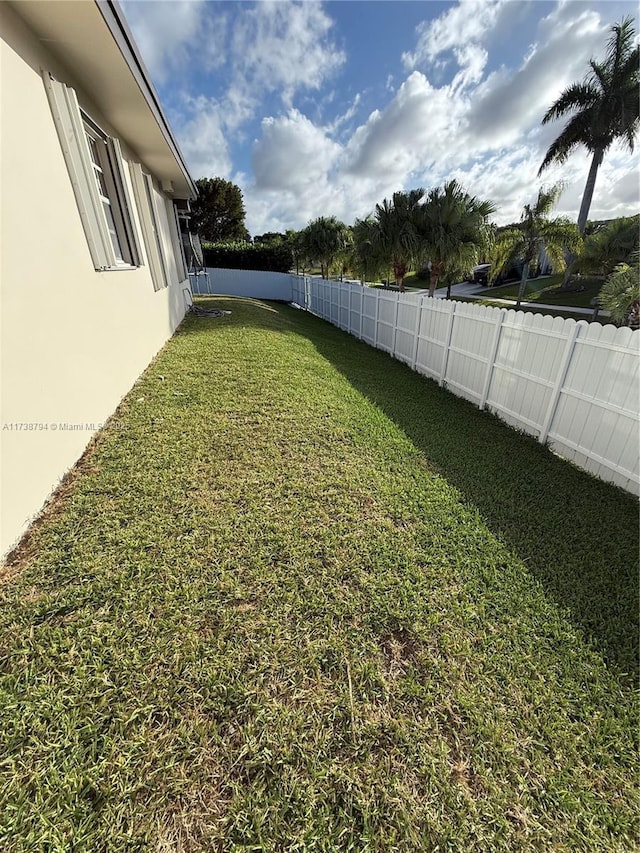 view of yard featuring a fenced backyard