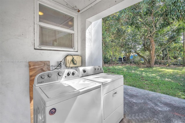 laundry area with washer and dryer