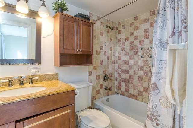 full bathroom featuring vanity, shower / bathtub combination with curtain, and toilet