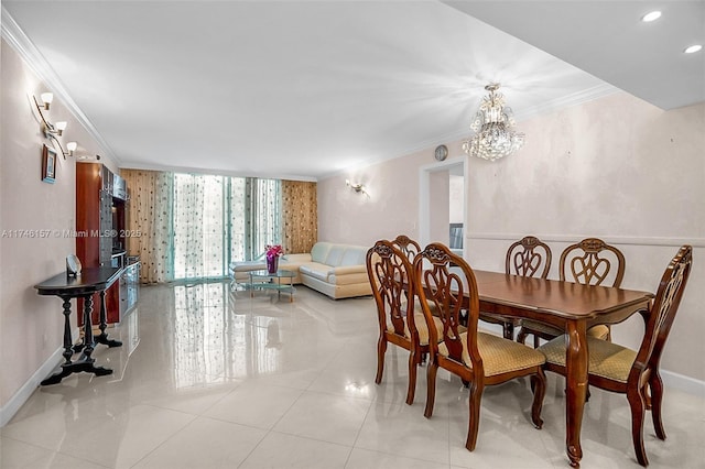 dining room with ornamental molding and light tile patterned floors