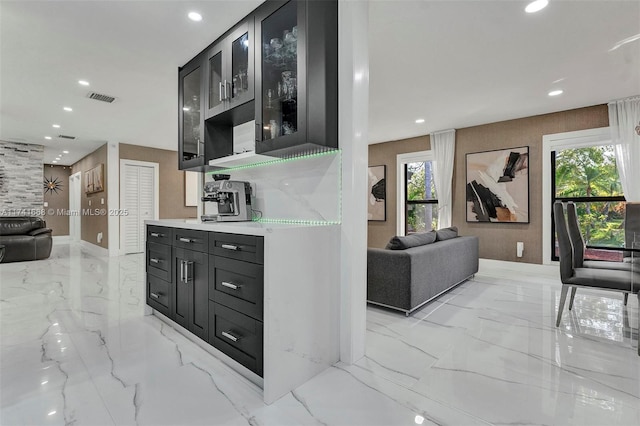 bar with recessed lighting, marble finish floor, and visible vents