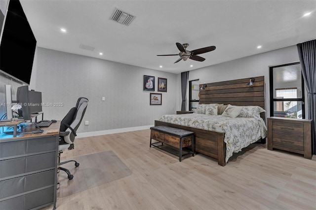 bedroom featuring light wood finished floors, recessed lighting, visible vents, a ceiling fan, and baseboards