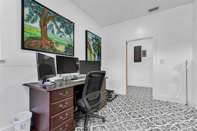 office featuring visible vents and baseboards