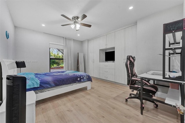 bedroom featuring ceiling fan, recessed lighting, and light wood-style floors