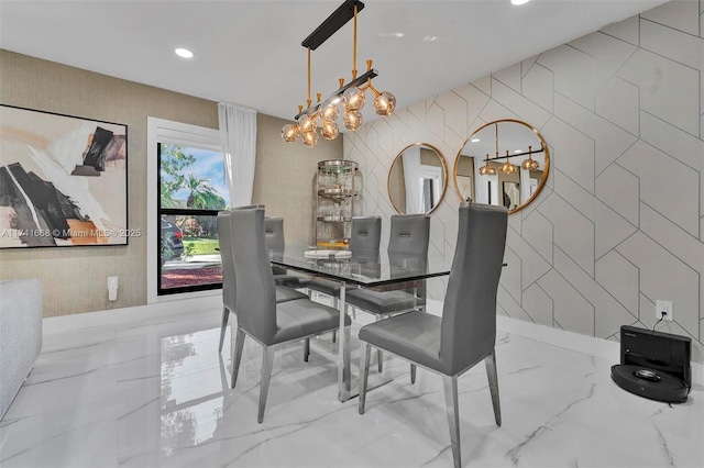 dining space with recessed lighting and marble finish floor