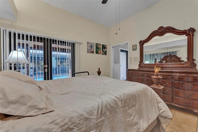 bedroom with ceiling fan and light tile patterned floors