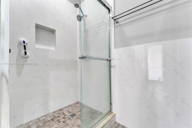 full bathroom with a shower stall