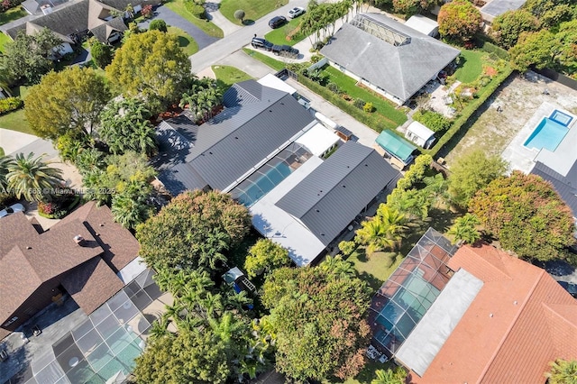 birds eye view of property with a residential view