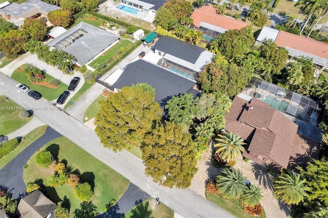 birds eye view of property with a residential view