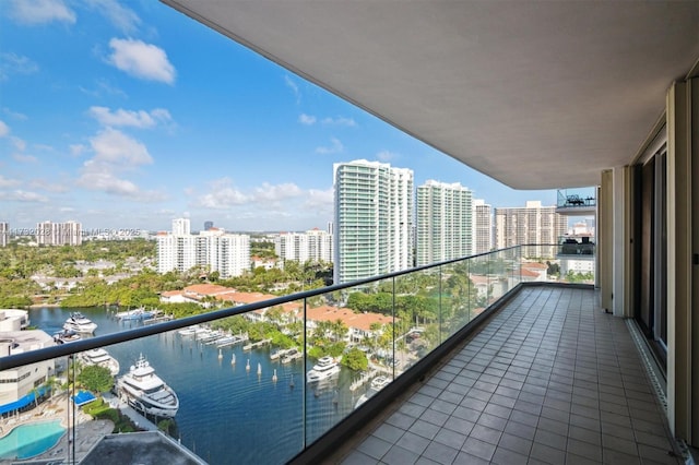 balcony featuring a water view