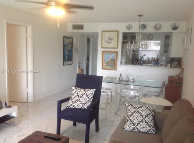 living room with ceiling fan