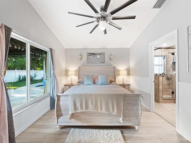 bedroom with vaulted ceiling, ceiling fan, and light hardwood / wood-style flooring