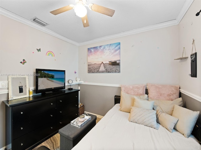 bedroom featuring ornamental molding and ceiling fan