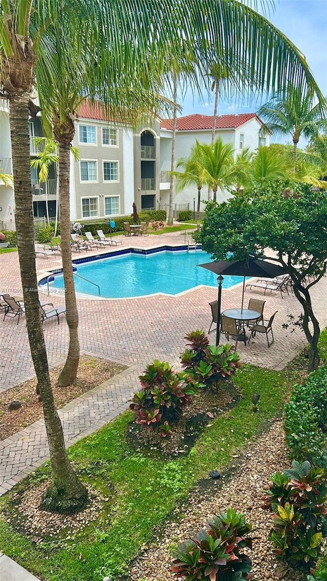 pool with a patio