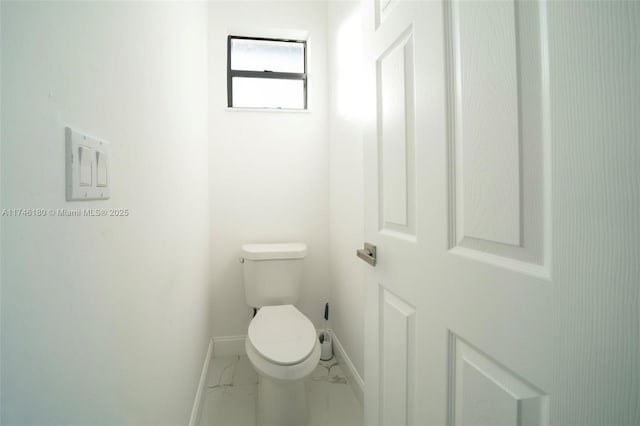 bathroom featuring toilet