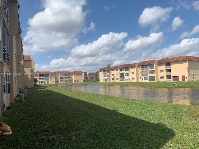 view of yard with a water view