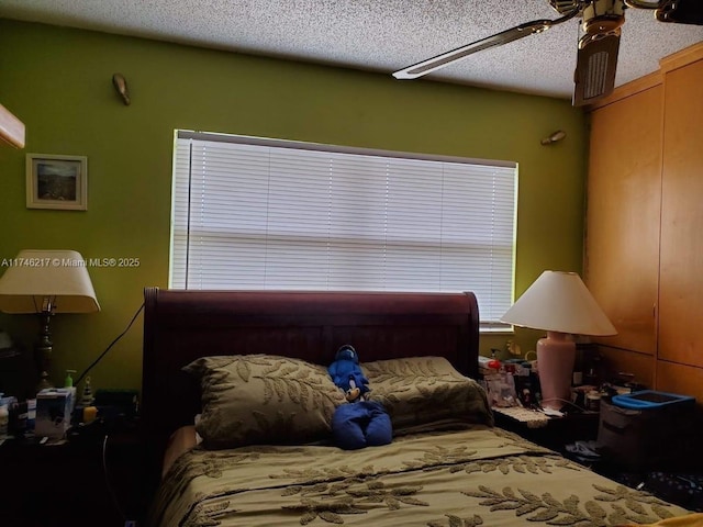 bedroom featuring a textured ceiling