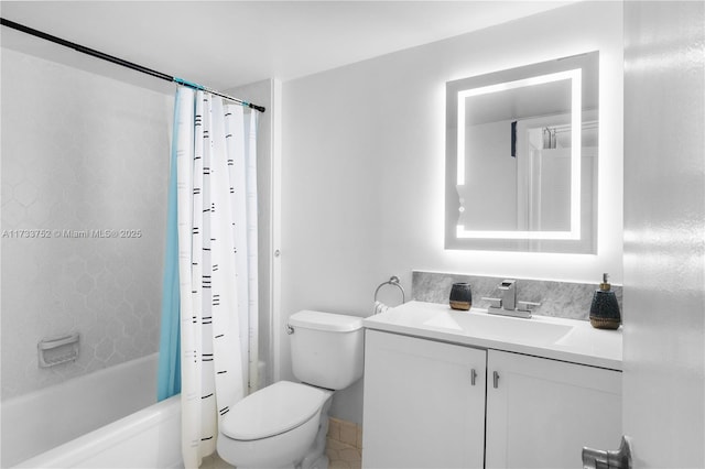 bathroom featuring toilet, shower / bath combination with curtain, and vanity