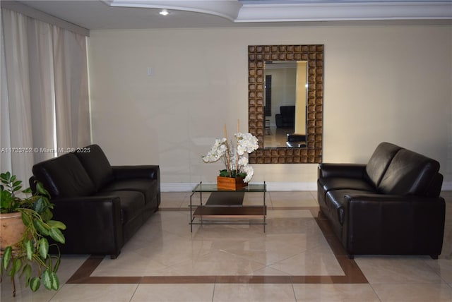 living area featuring tile patterned floors, baseboards, and recessed lighting