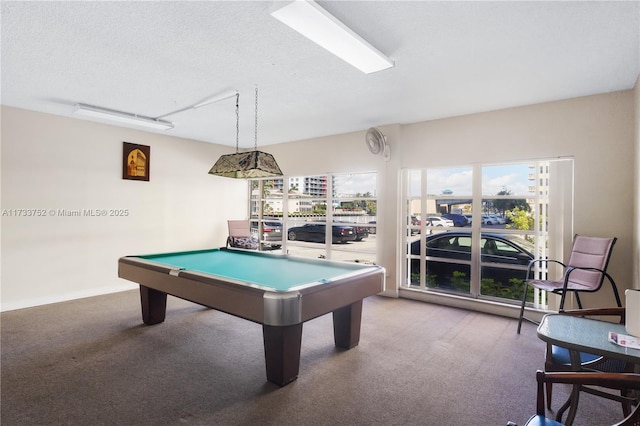game room featuring carpet floors, billiards, and a textured ceiling