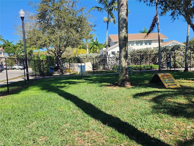 view of community featuring a yard