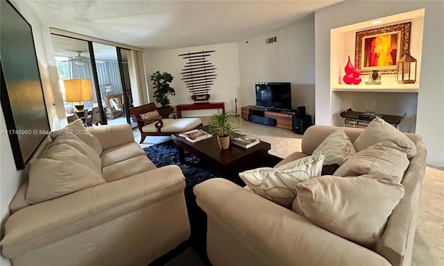 living room with a wall of windows