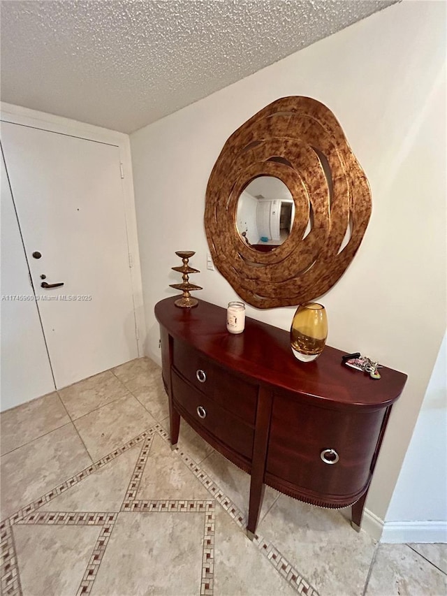 interior space with a textured ceiling