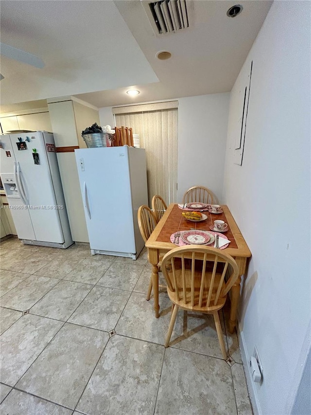 view of tiled dining area