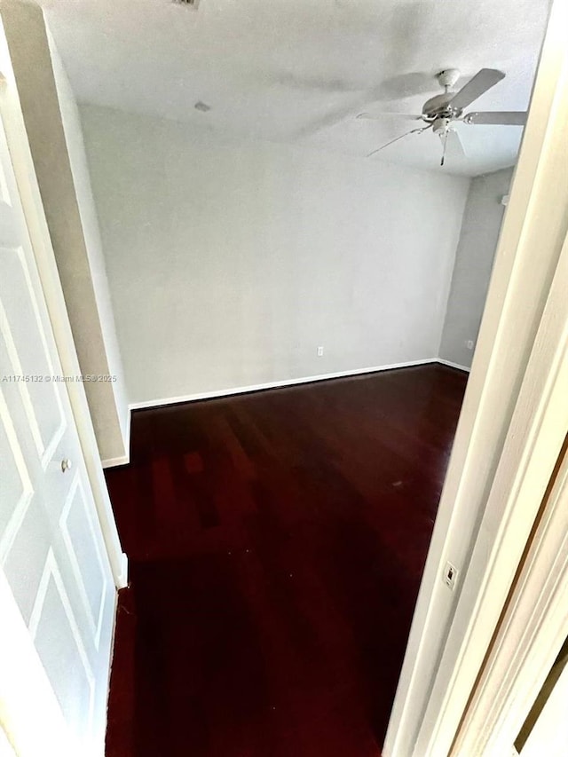 unfurnished room featuring ceiling fan