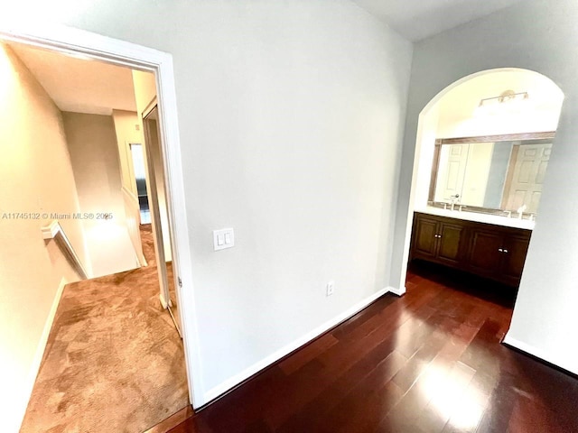 interior space with dark hardwood / wood-style floors