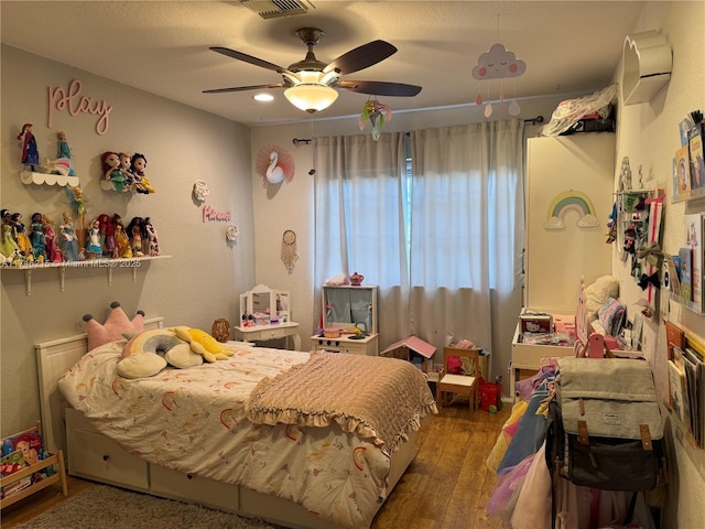 bedroom featuring dark wood-type flooring and ceiling fan