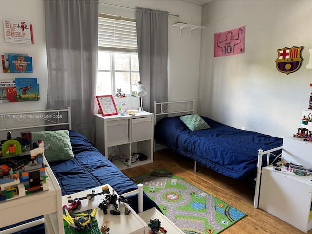 bedroom featuring light hardwood / wood-style floors