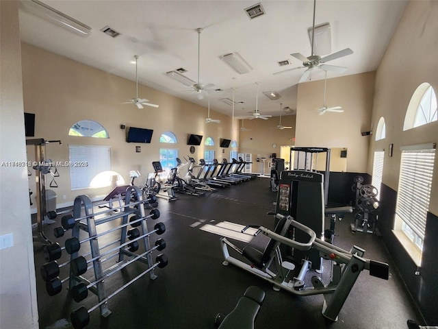 gym with high vaulted ceiling