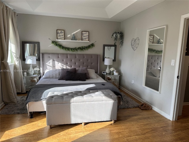 bedroom featuring wood-type flooring