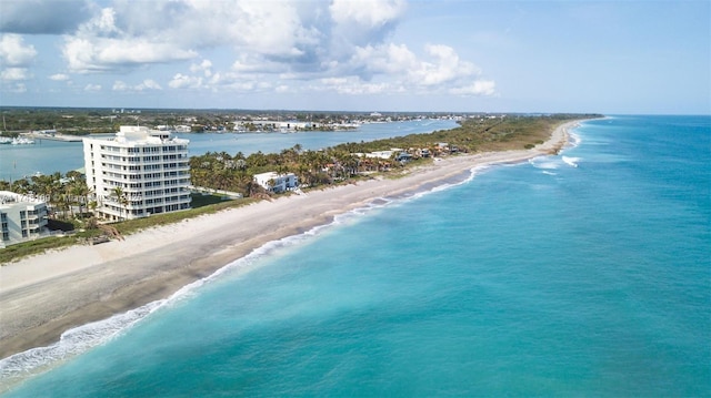 bird's eye view with a beach view and a water view