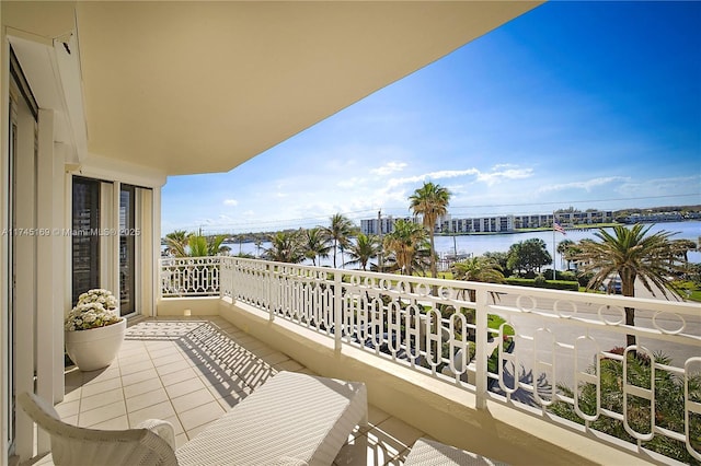 balcony featuring a water view