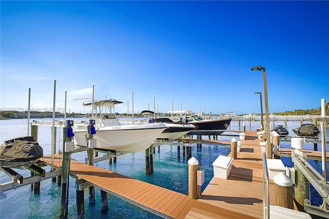 dock area featuring a water view and boat lift