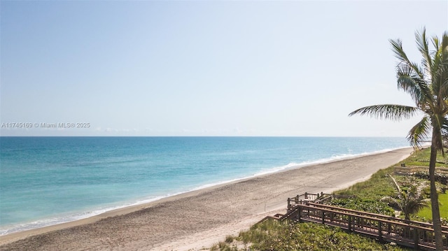 property view of water featuring a beach view