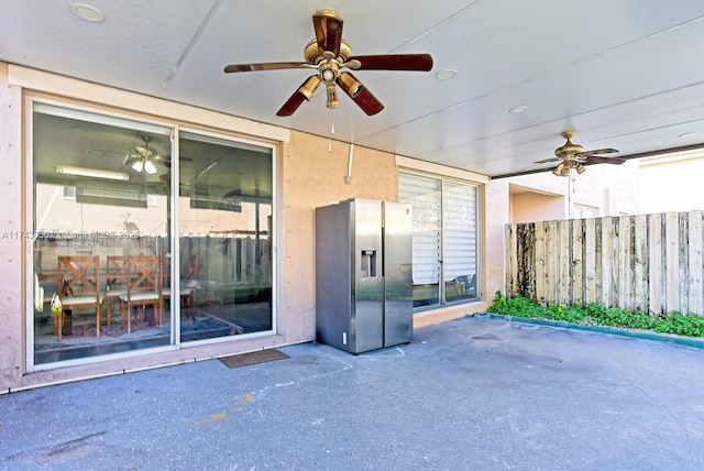 view of patio with ceiling fan