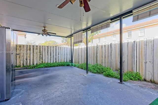 view of patio featuring ceiling fan