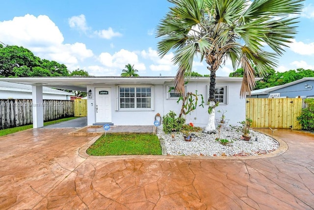 713 SW 6th Ave, Hallandale Beach, FL 33009 - view of front of house featuring a carport
