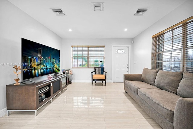713 SW 6th Ave, Hallandale Beach, FL 33009 - living room with light tile patterned floors