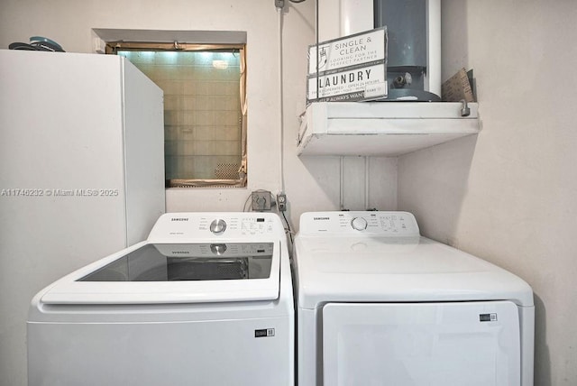 713 SW 6th Ave, Hallandale Beach, FL 33009 - clothes washing area with washing machine and clothes dryer