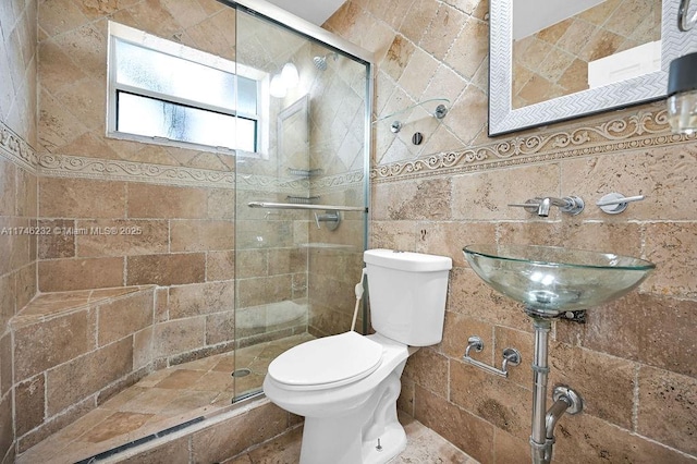 713 SW 6th Ave, Hallandale Beach, FL 33009 - bathroom with tile walls, sink, a shower with shower door, and toilet