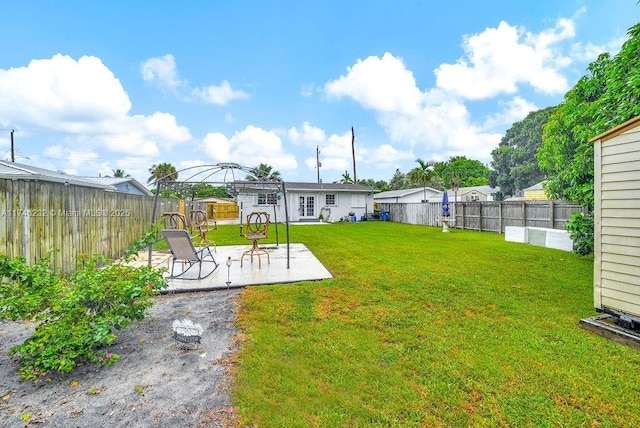 713 SW 6th Ave, Hallandale Beach, FL 33009 - view of yard featuring a gazebo and a patio area